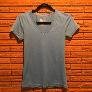 Light blue Nike Dri-Fit tee
